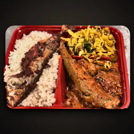 Fish fry, fish curry and rice tray